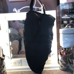 Torrid one piece swimsuit with mesh cut outs